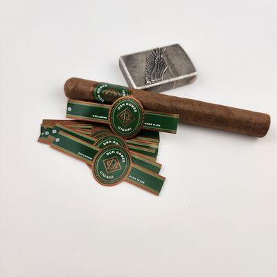 Buen precio Etiquetas de cigarros de papel de forma personalizada Impresión de pegatinas de papel en relieve Etiquetas de cigarrillos de anillo de banda de oro en línea