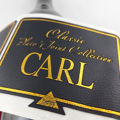 Buen precio Etiqueta de cuero de PU personalizada Impresión de oro en relieve Etiquetas de cuero personalizadas impermeables en línea
