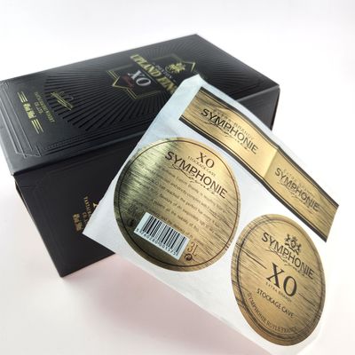 Buen precio Etiquetas de papel de aluminio biodegradable CMYK Etiquetas de whisky con relieve de brandy Etiquetas de vino en línea