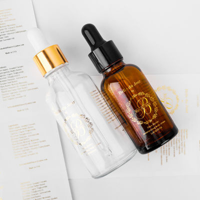 Buen precio Etiquetas de botellas personalizadas de papel de oro en relieve Etiquetas de maquillaje personalizadas hechas a mano en línea