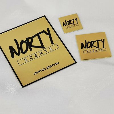Buen precio Carpeta de metal personalizada Perfume Etiqueta de níquel transferencia de oro en relieve 3d pegatina de metal en línea